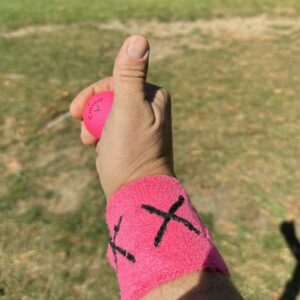 [Image: wristband-pink-thumbs-up-scaled-e1727745...00x300.jpg]